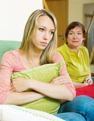 Senior woman and adult daughter having conflict